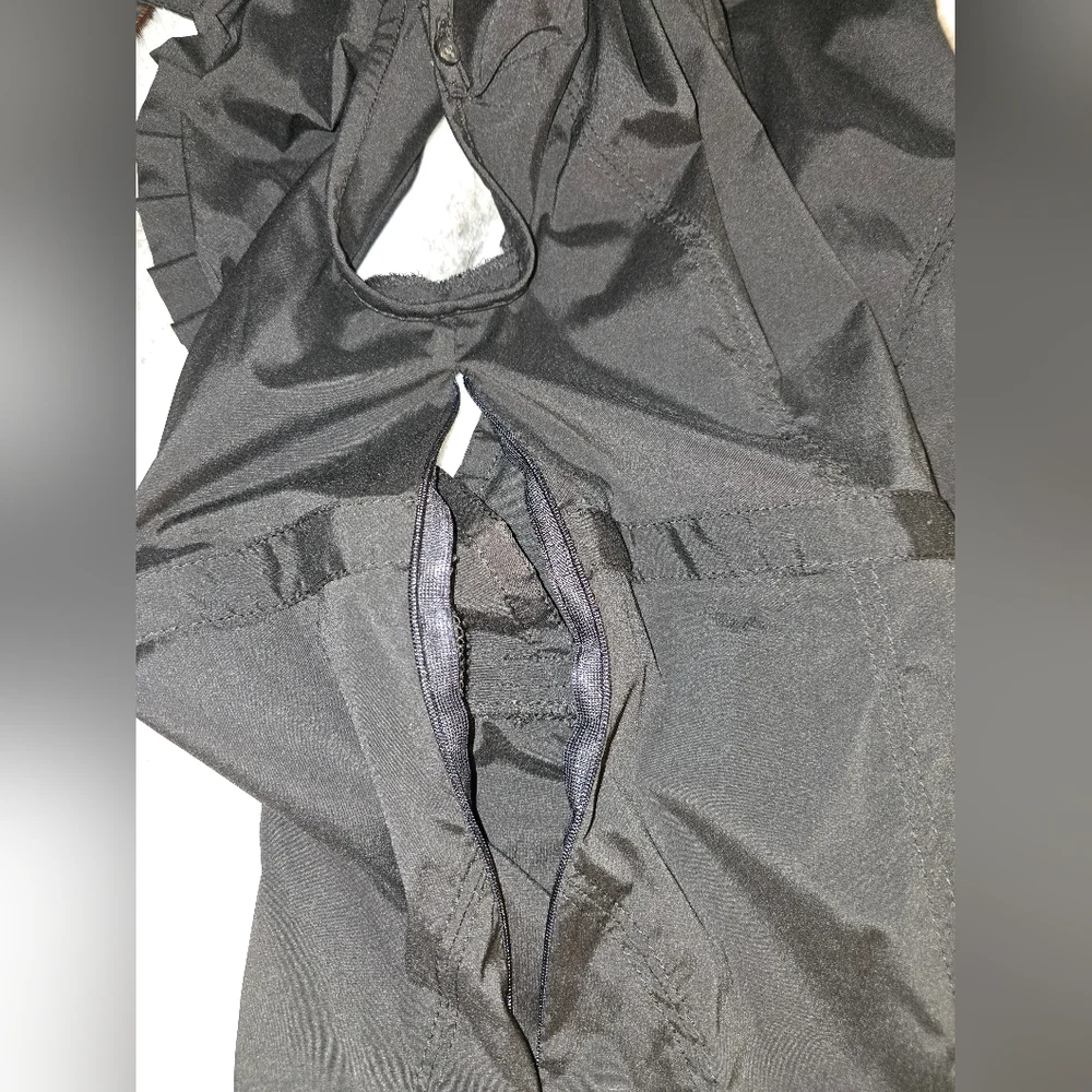 Express black size M womens blouse. Side zipper with buckle accent in front‎